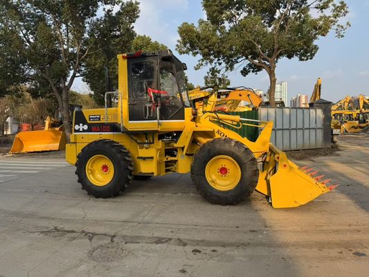 মূল জাপান ব্যবহৃত Komatsu WA100-1 চাকা লোডার বাগানে কাজ